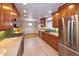 Spacious kitchen with stainless steel appliances, and a breakfast nook with lots of light at 7140 S Uinta St, Centennial, CO 80112
