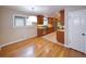 Eat in kitchen featuring wooden cabinets, updated countertops, and stainless steel appliances at 7140 S Uinta St, Centennial, CO 80112