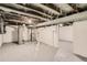 View of unfinished basement with utilities and exposed beams at 2421 Hooker St, Denver, CO 80211