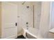 Bathroom featuring a tiled shower, tub, and sleek fixtures at 2421 Hooker St, Denver, CO 80211