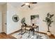 Bedroom with hardwood floors, ceiling fan and stylish decor at 2421 Hooker St, Denver, CO 80211