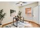 Bedroom with hardwood floors, ceiling fan, and natural light at 2421 Hooker St, Denver, CO 80211
