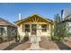 Charming home with a brick foundation and a well-maintained front yard at 2421 Hooker St, Denver, CO 80211