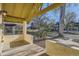 Covered front porch with brick columns, providing a relaxing outdoor space at 2421 Hooker St, Denver, CO 80211