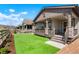 Charming front porch with stone accents, wooden railings, and a well-maintained lawn at 8052 Mount Kataka St, Littleton, CO 80125