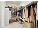Well-organized walk-in closet with ample shelving, hanging space, and storage for shoes and accessories at 8052 Mount Kataka St, Littleton, CO 80125