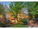 Landscaped backyard featuring a decorative fountain and lush greenery, perfect for relaxation at 5530 E 6Th Avenue Pkwy, Denver, CO 80220