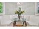 Cozy breakfast nook featuring a glass table, built-in seating, and natural light at 5530 E 6Th Avenue Pkwy, Denver, CO 80220