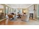 Bright living room with a fireplace, hardwood floors, and neutral-toned furniture at 5530 E 6Th Avenue Pkwy, Denver, CO 80220