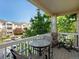Relaxing balcony with seating offering views of the surrounding neighborhood at 5726 N Genoa Way # 201, Aurora, CO 80019