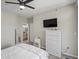 Comfortable bedroom with a view of the en-suite bathroom at 5726 N Genoa Way # 201, Aurora, CO 80019