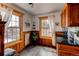 Cozy breakfast nook featuring natural light, hardwood floors, and a view of the outdoors at 1233 Starling Ln, Elizabeth, CO 80107