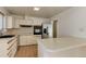 The kitchen is equipped with lots of storage and stainless steel appliances at 4755 S Irving St, Englewood, CO 80110