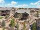Aerial view of a home with a well-manicured backyard and surrounding neighborhood at 6705 S Catawba Way, Aurora, CO 80016