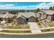 Charming single-Gathering home featuring a well-manicured lawn, mature landscaping, and an attached two-car garage at 6705 S Catawba Way, Aurora, CO 80016