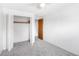 Bedroom with soft carpet, closet, and door leading to the other rooms at 13017 W 20Th Ave, Golden, CO 80401