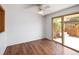 A large sliding glass door provides plenty of natural light in this dining room at 13017 W 20Th Ave, Golden, CO 80401