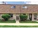 Charming townhouse with well-manicured front lawn and inviting entryway at 13017 W 20Th Ave, Golden, CO 80401