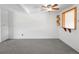 Gray carpet throughout the expansive living room at 13017 W 20Th Ave, Golden, CO 80401