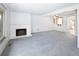 Bright living room with a cozy fireplace, and an open floor plan at 13017 W 20Th Ave, Golden, CO 80401