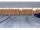 Designated covered parking area with secure wooden fencing and adjacent parking spots at 13017 W 20Th Ave, Golden, CO 80401