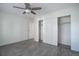 Bedroom with large closet with sliding doors and installed shelves at 3164 S Wheeling Way # 101, Aurora, CO 80014
