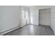 Bedroom with large closet with sliding doors and installed shelves at 3164 S Wheeling Way # 101, Aurora, CO 80014