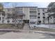 Exterior of building with multiple floors, windows, and bare trees at 3164 S Wheeling Way # 101, Aurora, CO 80014