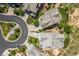 Aerial view of a residential area showcasing multiple houses and cul-de-sac at 10401 Maplebrook Way, Highlands Ranch, CO 80126