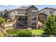 Backyard featuring a lawn, patio, deck, and privacy fence at 10401 Maplebrook Way, Highlands Ranch, CO 80126