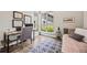 Inviting bedroom featuring a dedicated desk area and serene natural light at 10401 Maplebrook Way, Highlands Ranch, CO 80126
