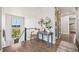 Stylish hallway with a view, hardwood floors and chic decor at 10401 Maplebrook Way, Highlands Ranch, CO 80126