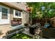 Cozy patio area with outdoor seating and a view of the backyard at 4676 S Dillon Ct # G, Aurora, CO 80015