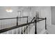 Bright upstairs hallway features white walls, dark trim and carpeted floors at 4792 Coltin Trl, Castle Rock, CO 80104