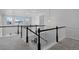 Upstairs loft area with white railings and lots of natural light from large windows at 4792 Coltin Trl, Castle Rock, CO 80104