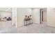 A finished basement with plush carpeting provides a versatile living space for various activities at 135 Garnet St, Broomfield, CO 80020