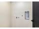 Bright laundry room with modern hookups, promising convenience and functionality at 135 Garnet St, Broomfield, CO 80020