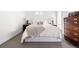 Serene bedroom features a comfortable bed, soft lighting, and tasteful decor at 4395 Zuni St, Denver, CO 80211