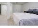 Neutral bedroom with large bed and walk-in closet access; ideal for relaxing and unwinding at 3292 S Wabash Ct, Denver, CO 80231