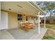 Charming patio featuring a neutral rug, and a backyard view including swingset at 3292 S Wabash Ct, Denver, CO 80231