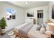 Cozy bedroom featuring a comfortable bed, closet and a large window for natural light at 9400 High St, Thornton, CO 80229