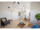 Spacious living room with vaulted ceilings, bright natural light, and luxury vinyl floors at 12820 Ironstone Way # 301, Parker, CO 80134