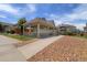 Charming outdoor pavilion with a covered seating area, beautifully landscaped with a paved walkway in a well-maintained neighborhood at 12820 Ironstone Way # 301, Parker, CO 80134
