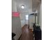 Functional laundry room with washer, dryer, storage, and a convenient folding area at 58117 E 42Nd Dr, Strasburg, CO 80136