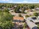 Charming single-story home with large backyard featuring a patio, located in a desirable neighborhood with mature trees at 1568 S Osceola Way, Denver, CO 80219