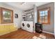 Functional laundry room with ample storage and natural light at 1568 S Osceola Way, Denver, CO 80219