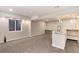 Finished basement featuring a wet bar, recessed lighting, and a window at 12569 S Sopris Creek Dr, Parker, CO 80134