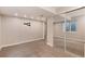 Bedroom featuring closet with mirror doors, carpet, and window at 12569 S Sopris Creek Dr, Parker, CO 80134