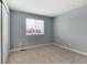 Bedroom featuring a large window with neighborhood view, and closet at 12569 S Sopris Creek Dr, Parker, CO 80134