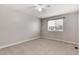 Bright bedroom with a large window allowing natural light to fill the space at 12569 S Sopris Creek Dr, Parker, CO 80134